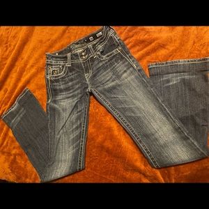 Miss Me bootcut jeans with
lots of lace detail in excellent pre loved
condition.